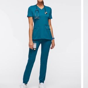 Jaanuu scrub set size medium Carribean blue Like new!